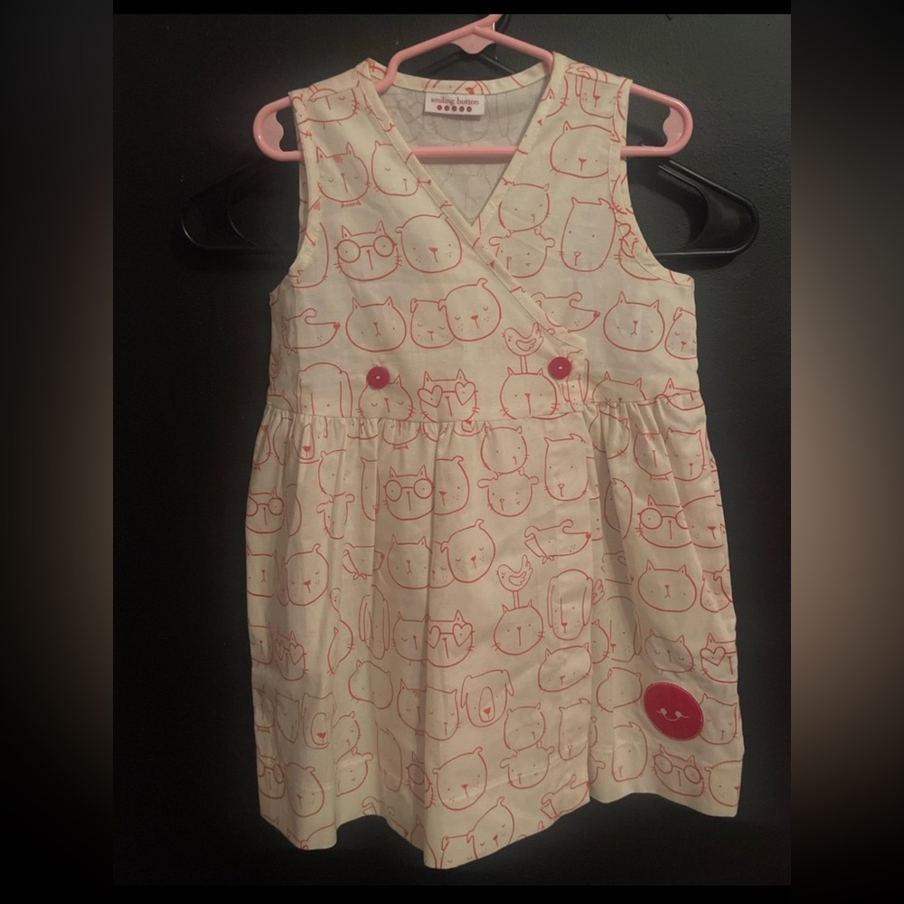 Smiling button dress